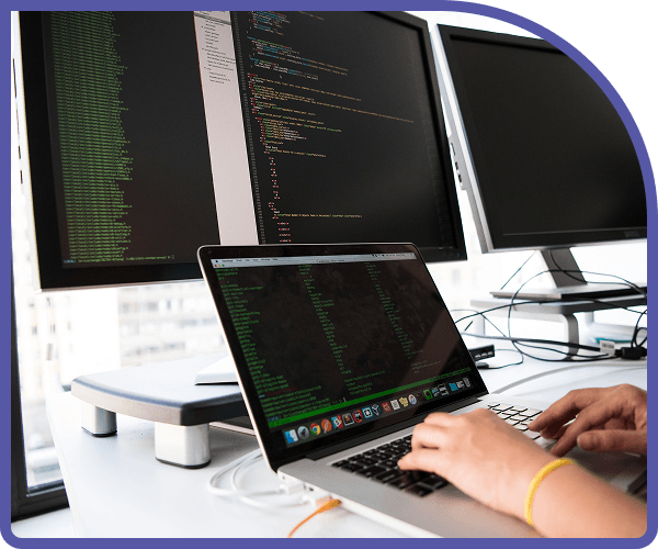 Developer working with multiple monitors